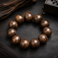 Golden Silk Nanmu Sunken Wood Longdan Pattern Bracelet